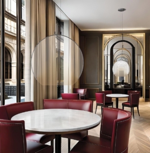 a boutique cafe with a marble-top table as the focal point, whil